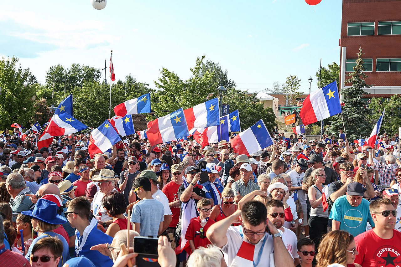 Le tintamarre du Congrès mondial acadien en 2019. Par Nouveau-Brunswick  Domaine public
